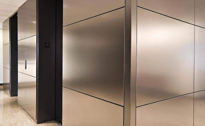 Anti-fingerprint stainless steel panels were used for durable and stylish wall coverings