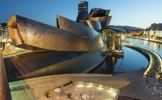 Colored stainless steel was used as a feature panels and framing in the museum reception
